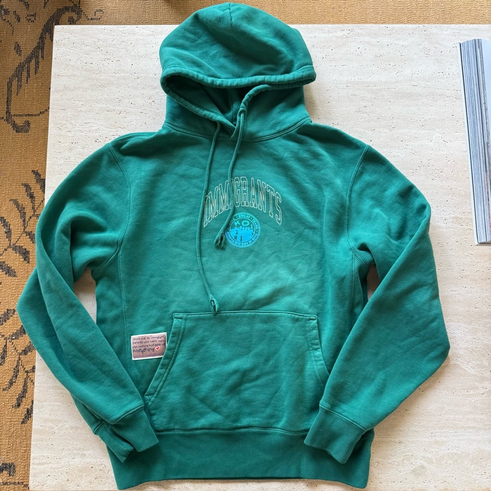 Kids of immigrants this is for our family green hoodie M